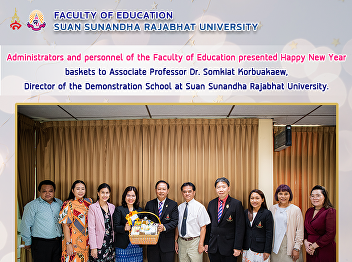 Administrators and personnel of the
Faculty of Education presented Happy New
Year baskets to Associate Professor Dr.
Somkiat Korbuakaew, Director of the
Demonstration School at Suan Sunandha
Rajabhat University.