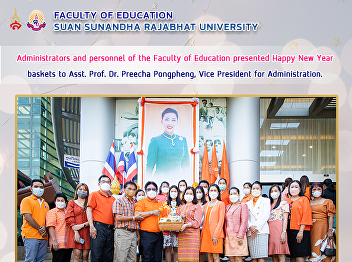 Administrators and personnel of the
Faculty of Education presented Happy New
Year baskets to Asst. Prof. Dr. Preecha
Pongpheng, Vice President for
Administration.