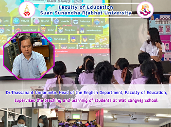 Dr.Thassanant Unnanantn, Head of the
English Department, Faculty of
Education, supervises the teaching and
learning of students at Wat Sangvej
School.